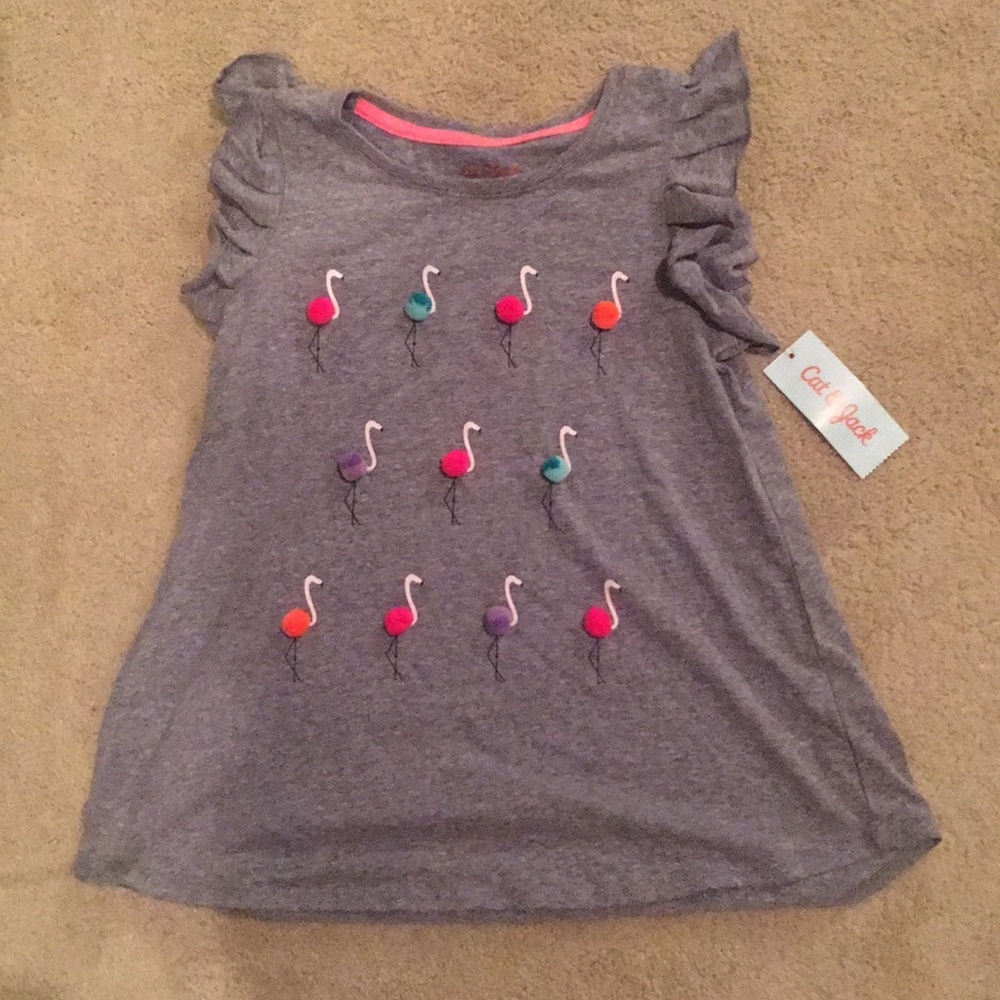 Flamingo shirt with pom-poms